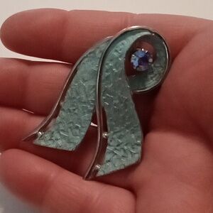 #786.  Vintage Kramer Silver Toned, Blue Aurora Beurialis Rhinestone Brooch.